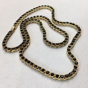 Gold tennis chain with onyx stones